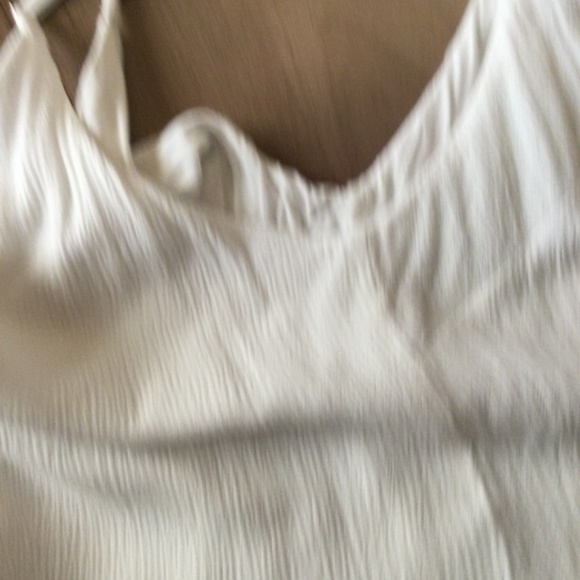 Lulu’s white sundress. - Picture 7 of 11